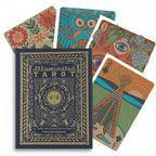 The Witches' Quest The Illuminated Tarot 53-card deck with vibrant illustrated cards and a royal blue keepsake box.