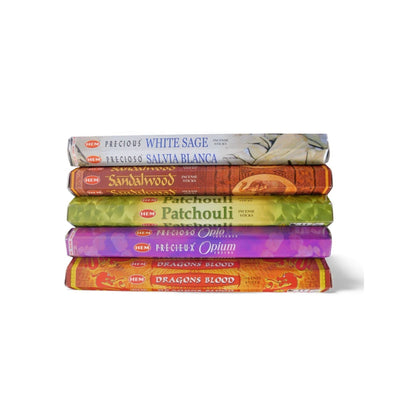 The Witches' Quest incense pack featuring five HEM scent tubes including White Sage, Sandalwood, Patchouli, and Opium.