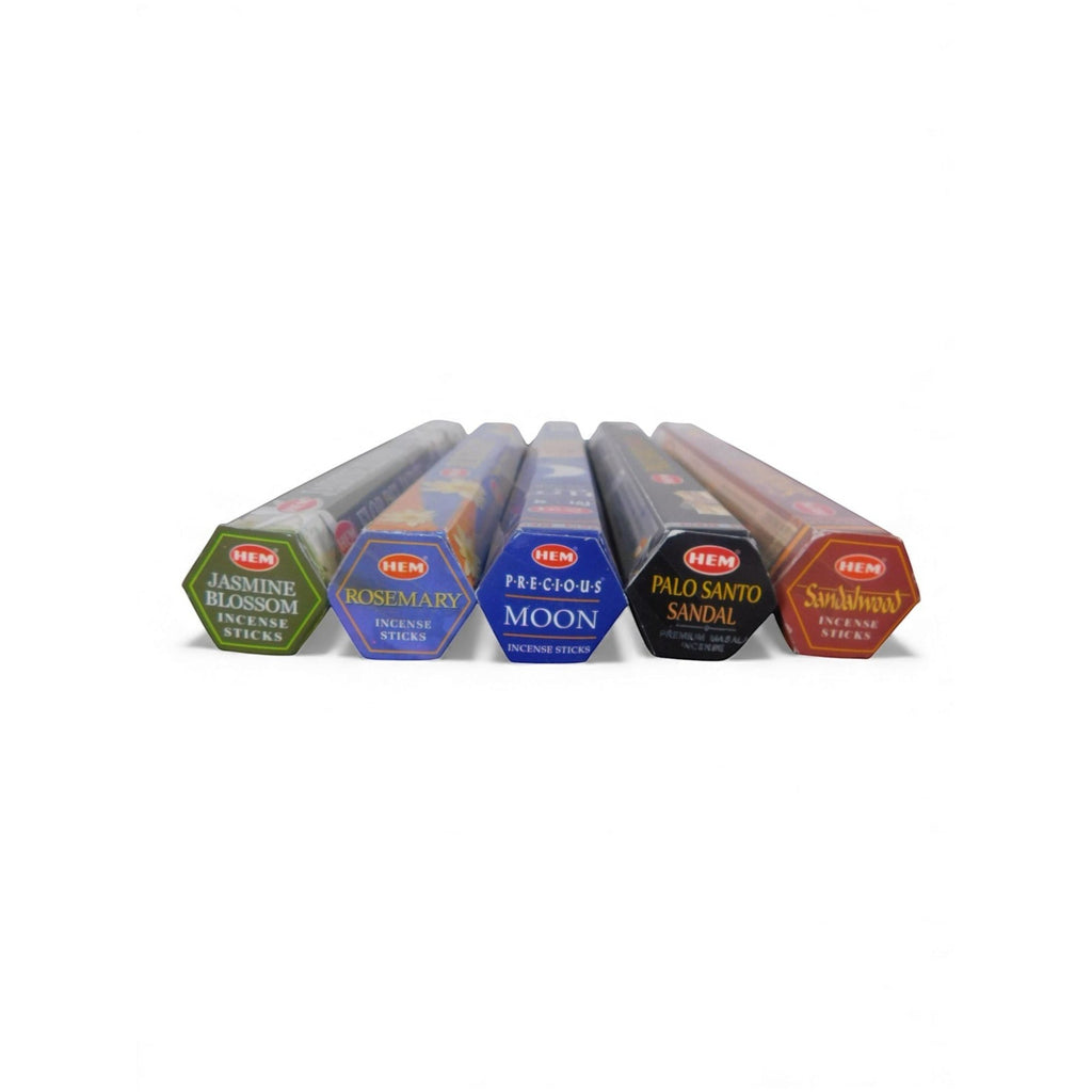 The Witches' Quest lunar incense pack featuring five hexagonal tubes of HEM scented sticks for ritual moon work.