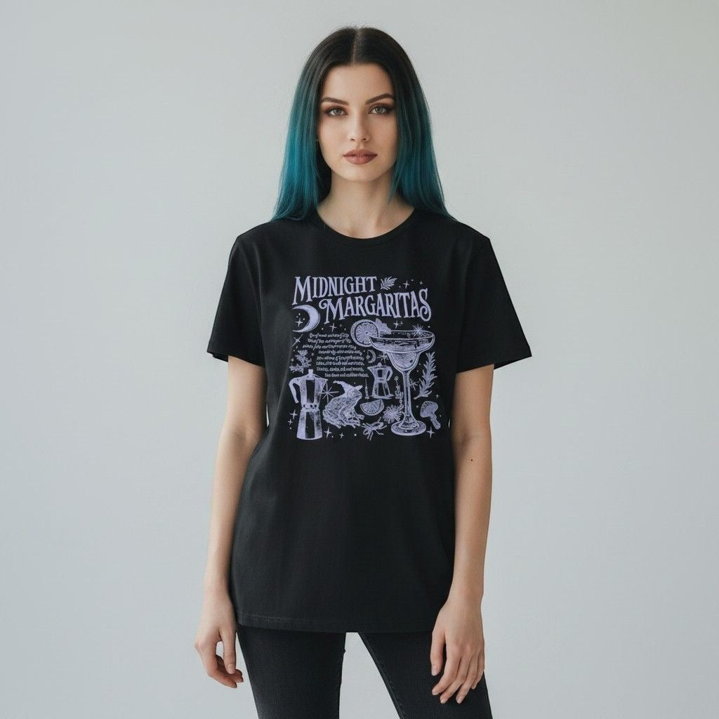 The Witches' Quest black cotton crewneck t-shirt with white Midnight Margaritas celestial and cocktail graphic print.