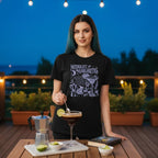 The Witches' Quest black cotton crewneck t-shirt featuring a white Midnight Margaritas graphic print on a woman.