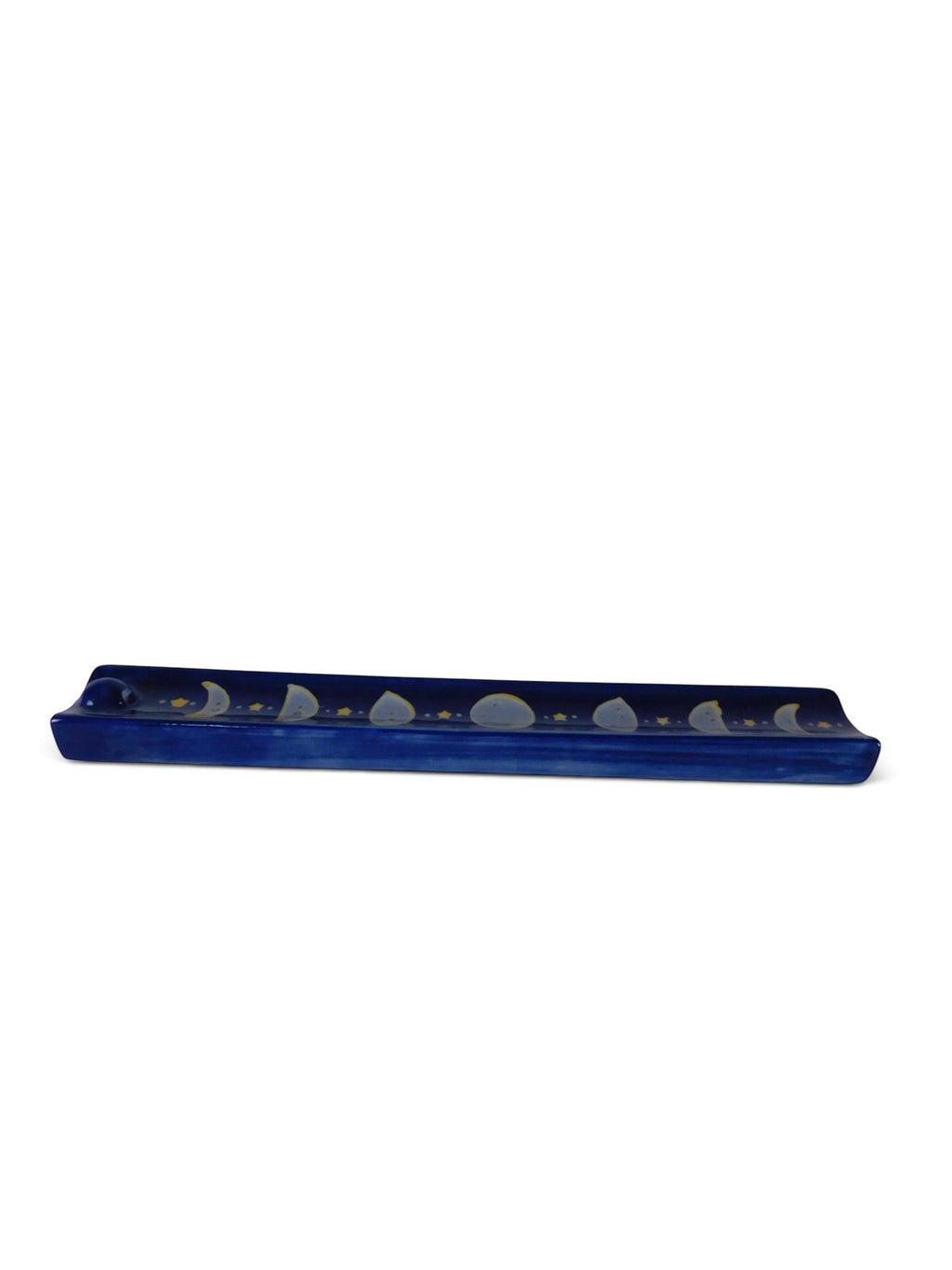 The Witches' Quest midnight blue ceramic incense stick holder with hand-painted moon phase cycle and golden stars.