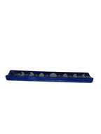 The Witches' Quest midnight blue ceramic incense stick holder with hand-painted moon phase cycle and golden stars.