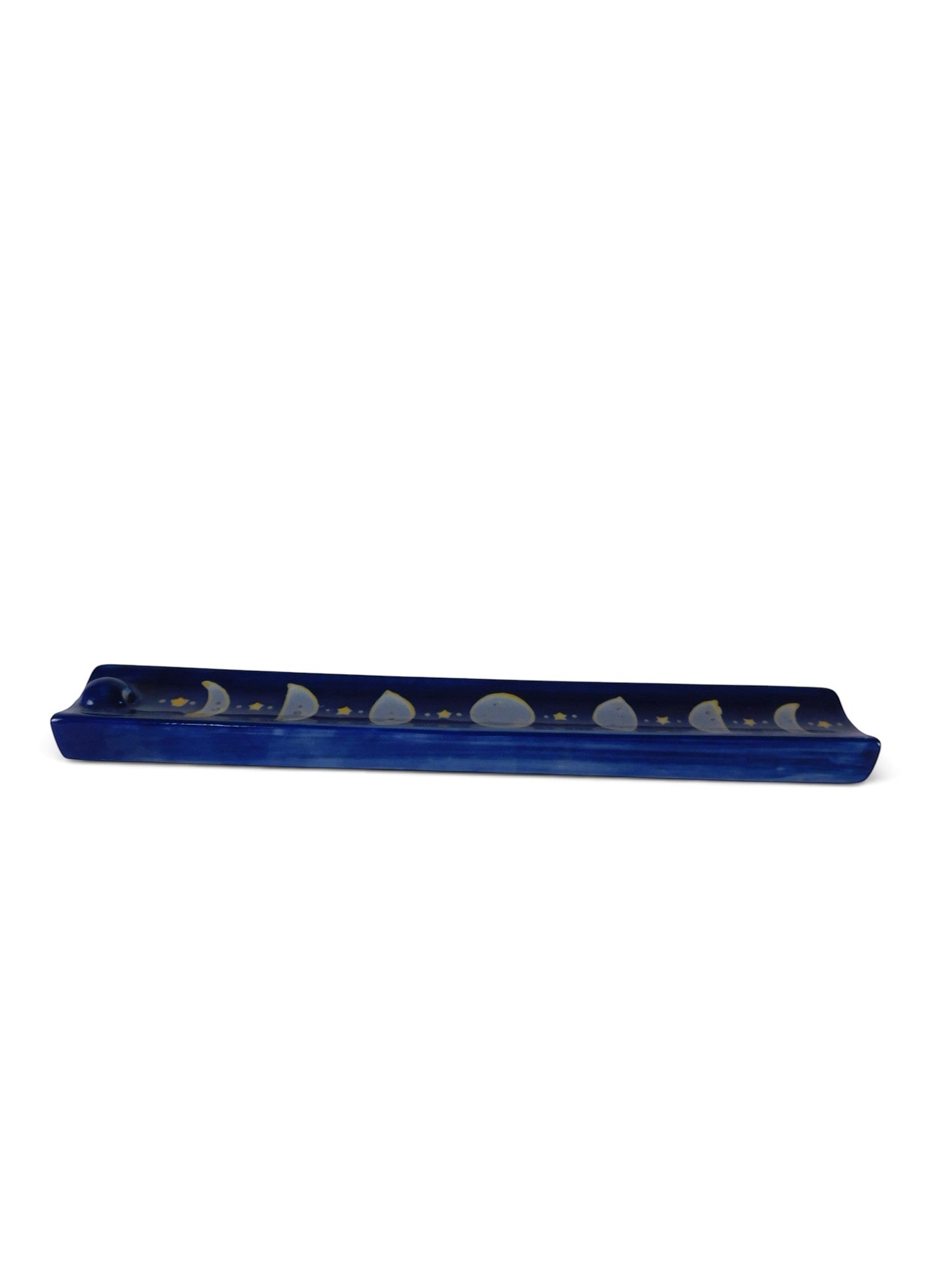 The Witches' Quest midnight blue ceramic incense stick holder with hand-painted moon phase cycle and golden stars.