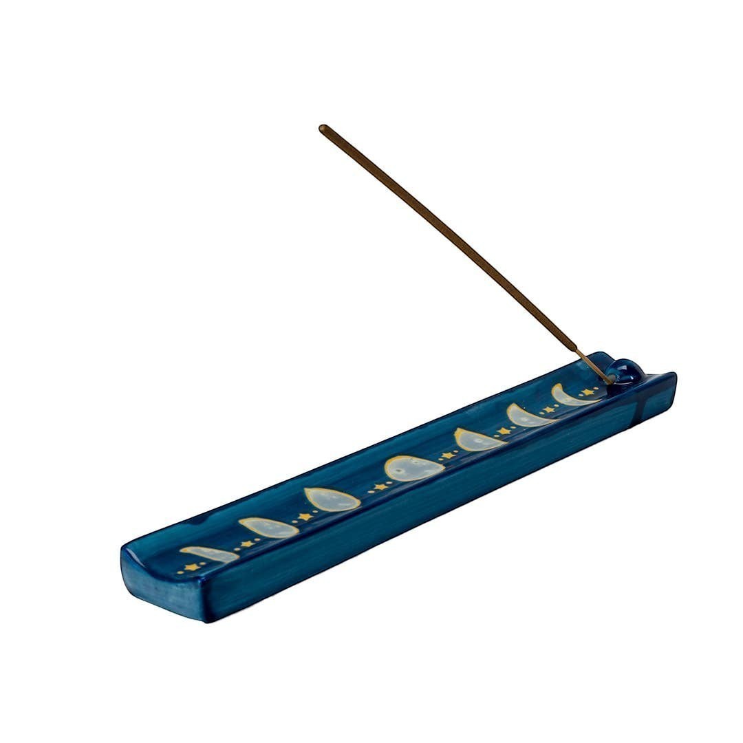 The Witches' Quest midnight blue ceramic incense stick holder with hand-painted moon phases and golden stars