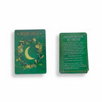The Witches' Quest spell deck cards featuring a green moon spell card and an incantation card with botanical art.