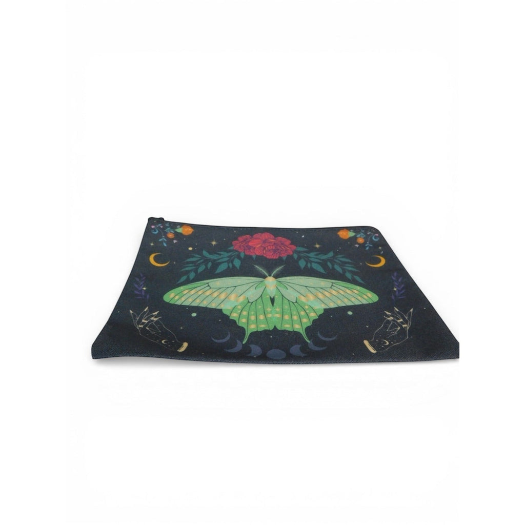 The Witches' Quest black cosmetic bag featuring a green luna moth, moon phases, and floral celestial artwork.