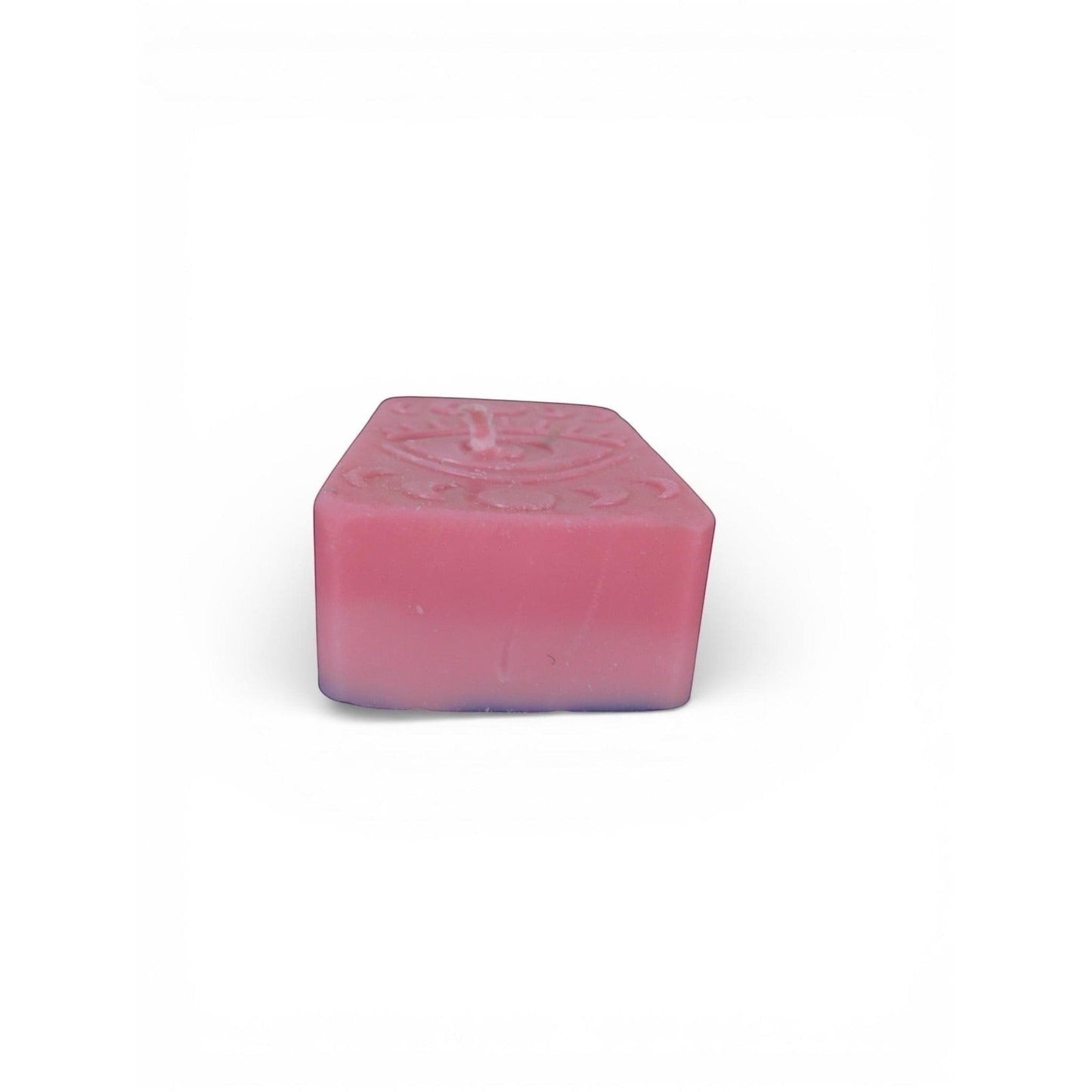 The Witches' Quest handmade pink rectangle wax candle with embossed mystical eye and moon phase design.