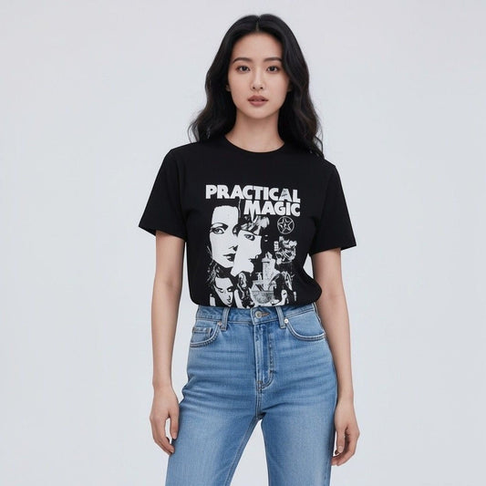 The Witches' Quest black cotton crewneck t-shirt with a white Practical Magic graphic print worn by a woman.