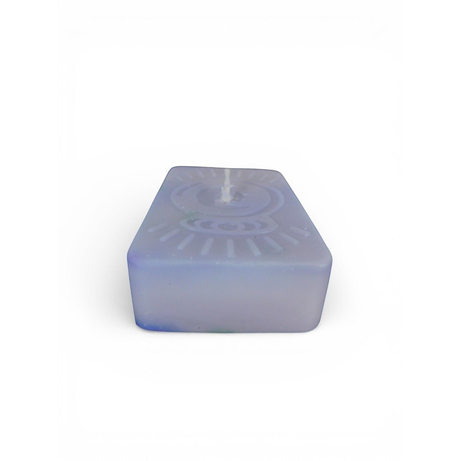 The Witches' Quest handmade purple rectangular wax candle with an embossed celestial moon and sun ray emblem.