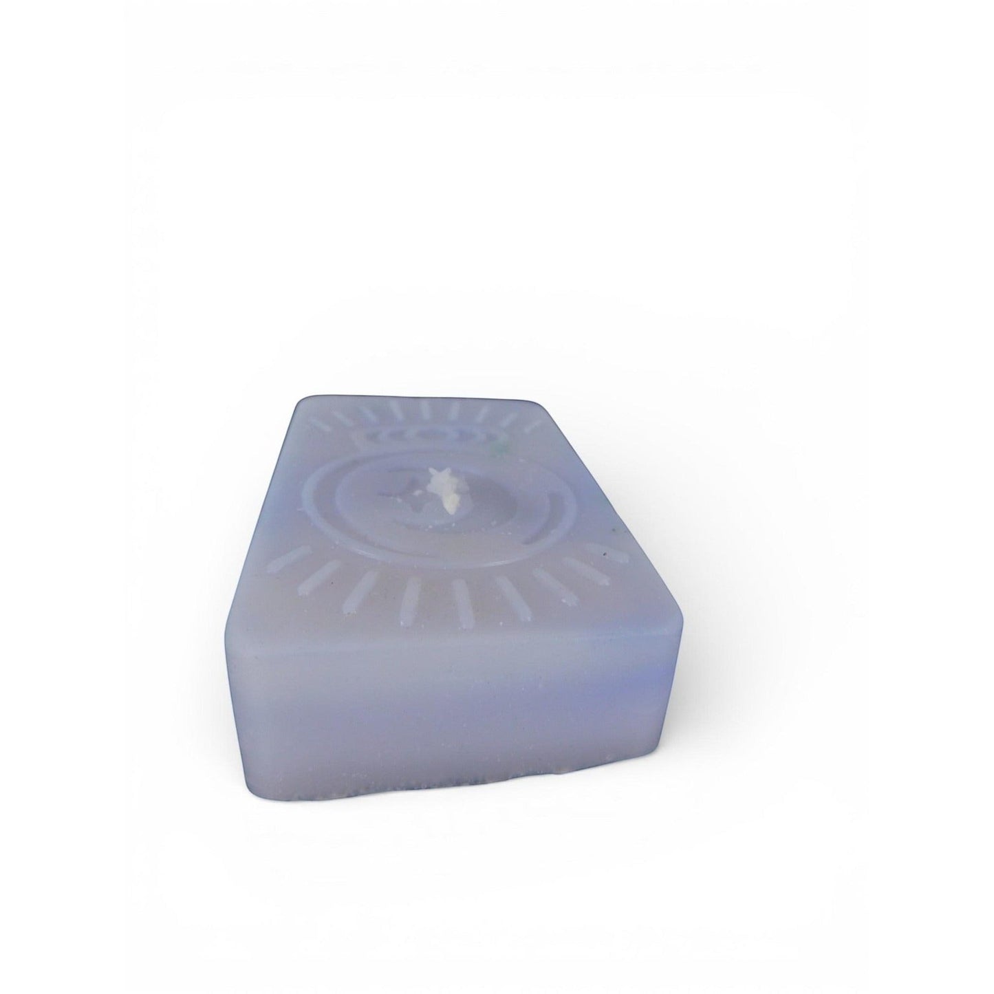 The Witches' Quest handmade purple rectangular wax candle with an embossed celestial moon and sun ray emblem.