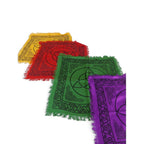 The Witches' Quest set of four rainbow-colored Celtic knot altar cloths with fringed edges for ritual and tarot use.