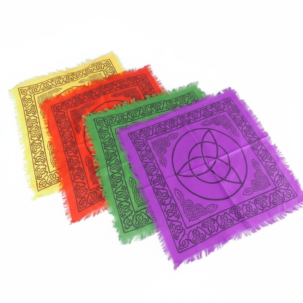 The Witches' Quest set of 4 rainbow altar cloths with black triquetra and Celtic knot prints and fringed edges.