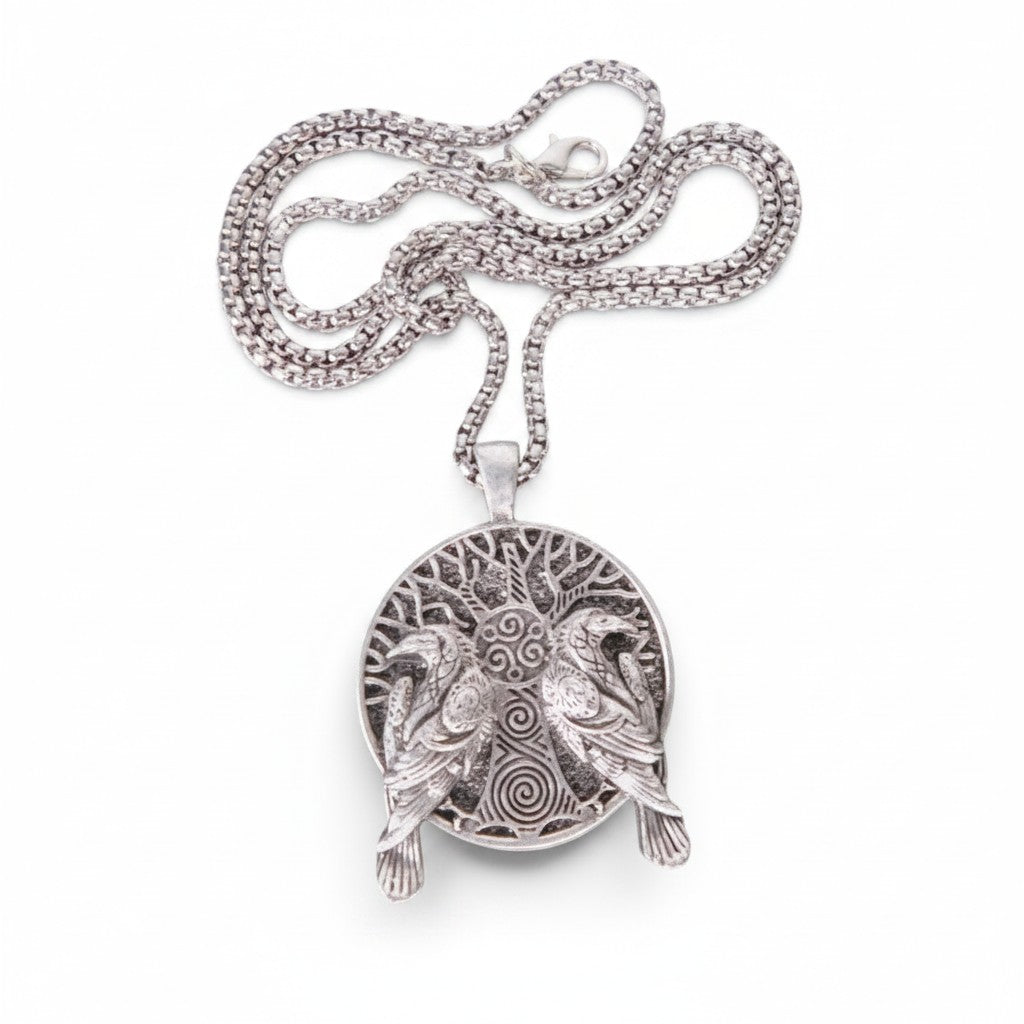The Witches' Quest silver metal alloy pendant necklace featuring an intricate tree of life and twin raven design.