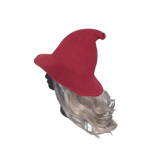 The Witches' Quest deep red pointed witch hat on a mannequin with wavy blonde hair for a gothic or bohemian look.