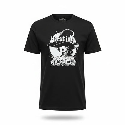 The Witches' Quest black unisex cotton t-shirt featuring a white distressed Resting Witch Face moon graphic.