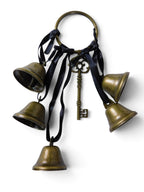 The Witches' Quest ritual bells featuring antique-style brass bells and a vintage key tied with black ribbon.