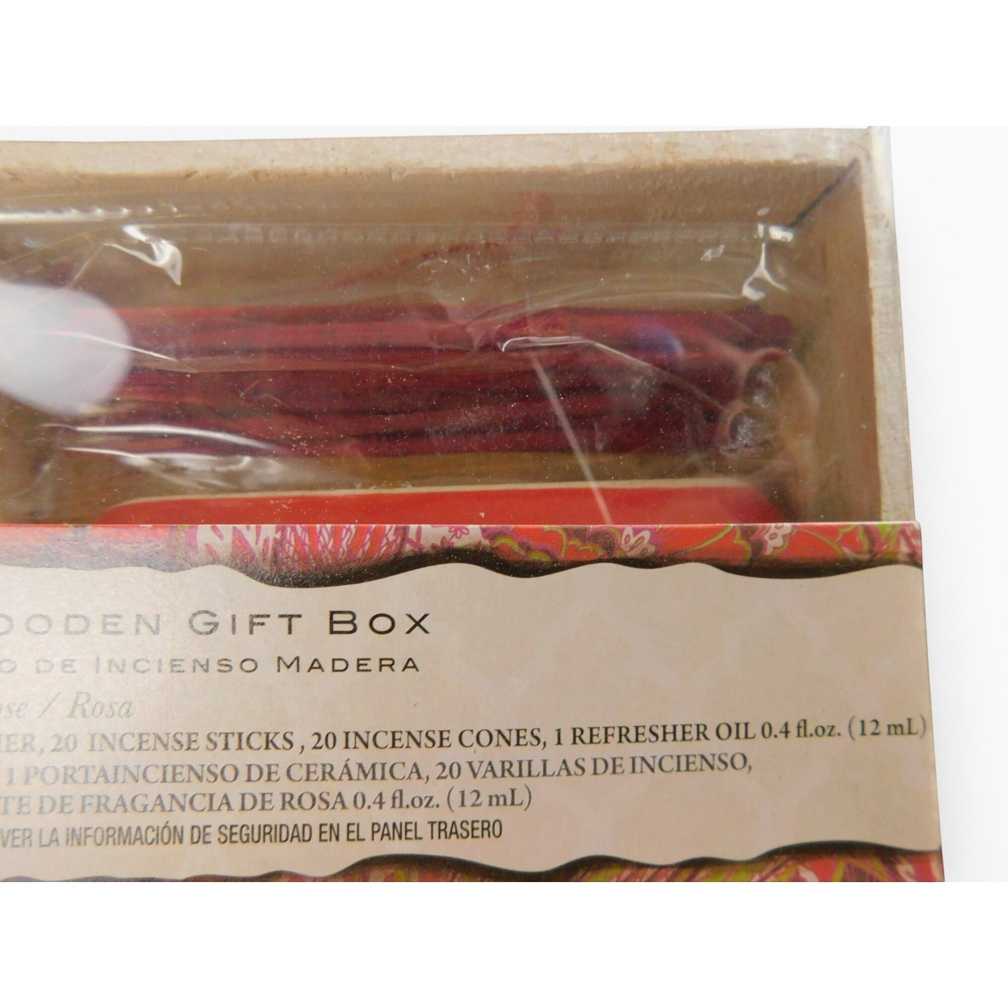 The Witches' Quest rose incense gift set in a wooden box with sticks, cones, fragrance oil, and ceramic ash catcher.