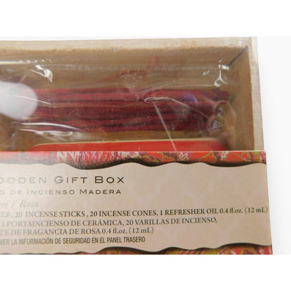 The Witches' Quest rose incense gift set in a wooden box with sticks, cones, fragrance oil, and ceramic ash catcher.