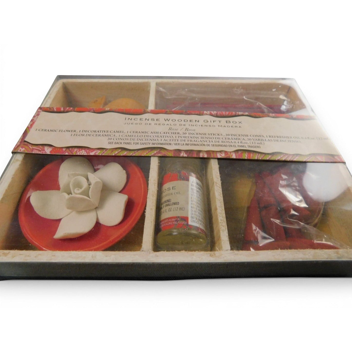 The Witches' Quest rose incense gift set with ceramic flower ash catcher, fragrance oil, and sticks in a wooden box.