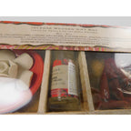 The Witches' Quest incense gift set featuring rose fragrance oil, ceramic flower, and incense sticks in a wooden box