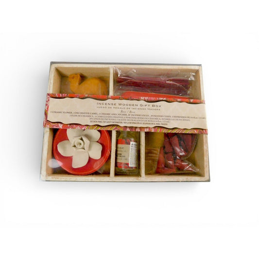 The Witches' Quest rose incense gift set in a wooden box with ceramic flower, camel figurine, sticks, and oil.