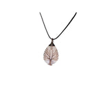 The Witches' Quest rose quartz teardrop pendant necklace with a copper wire wrapped tree of life design on a black cord