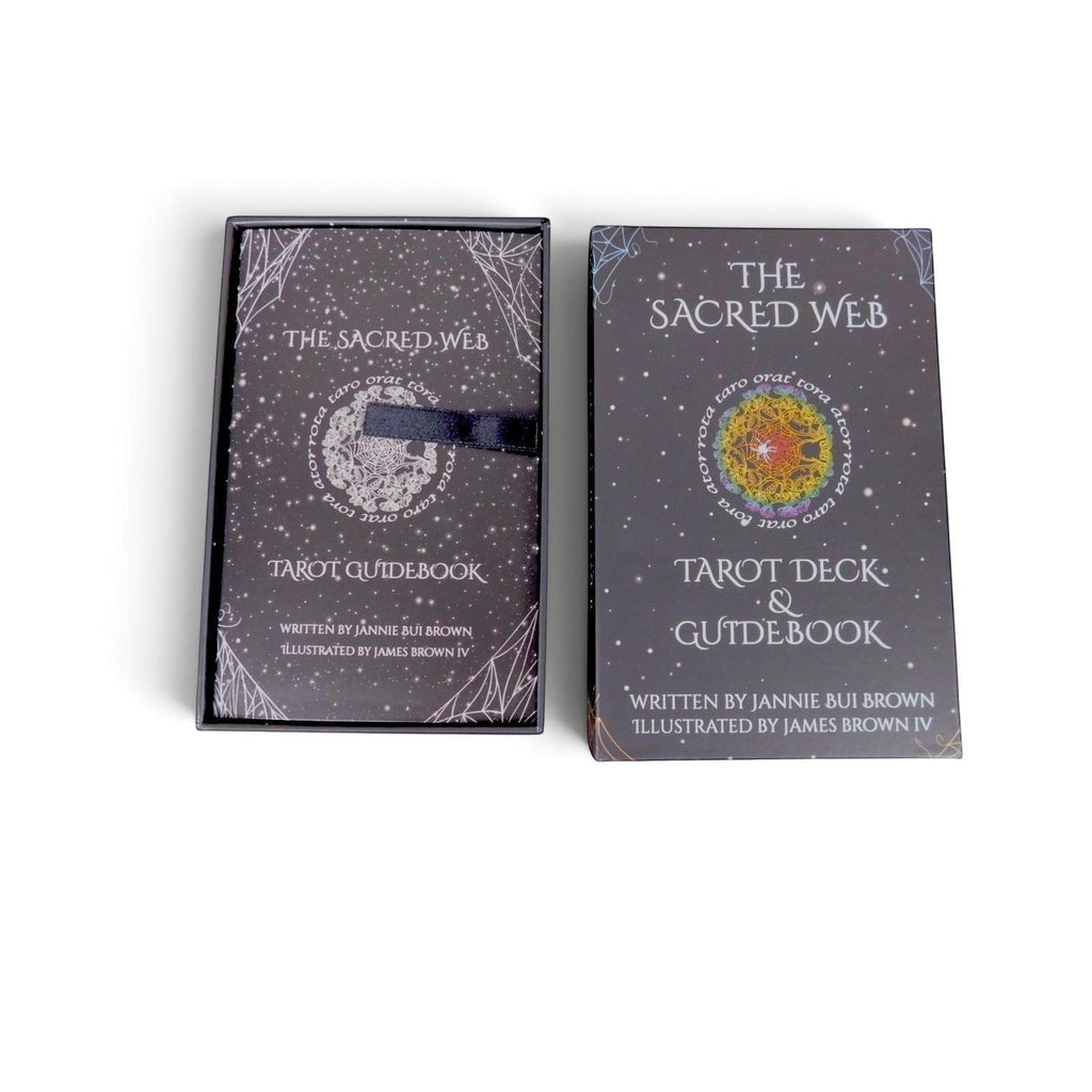The Witches' Quest The Sacred Web tarot deck and guidebook set in a dark charcoal box with rainbow mandala artwork.