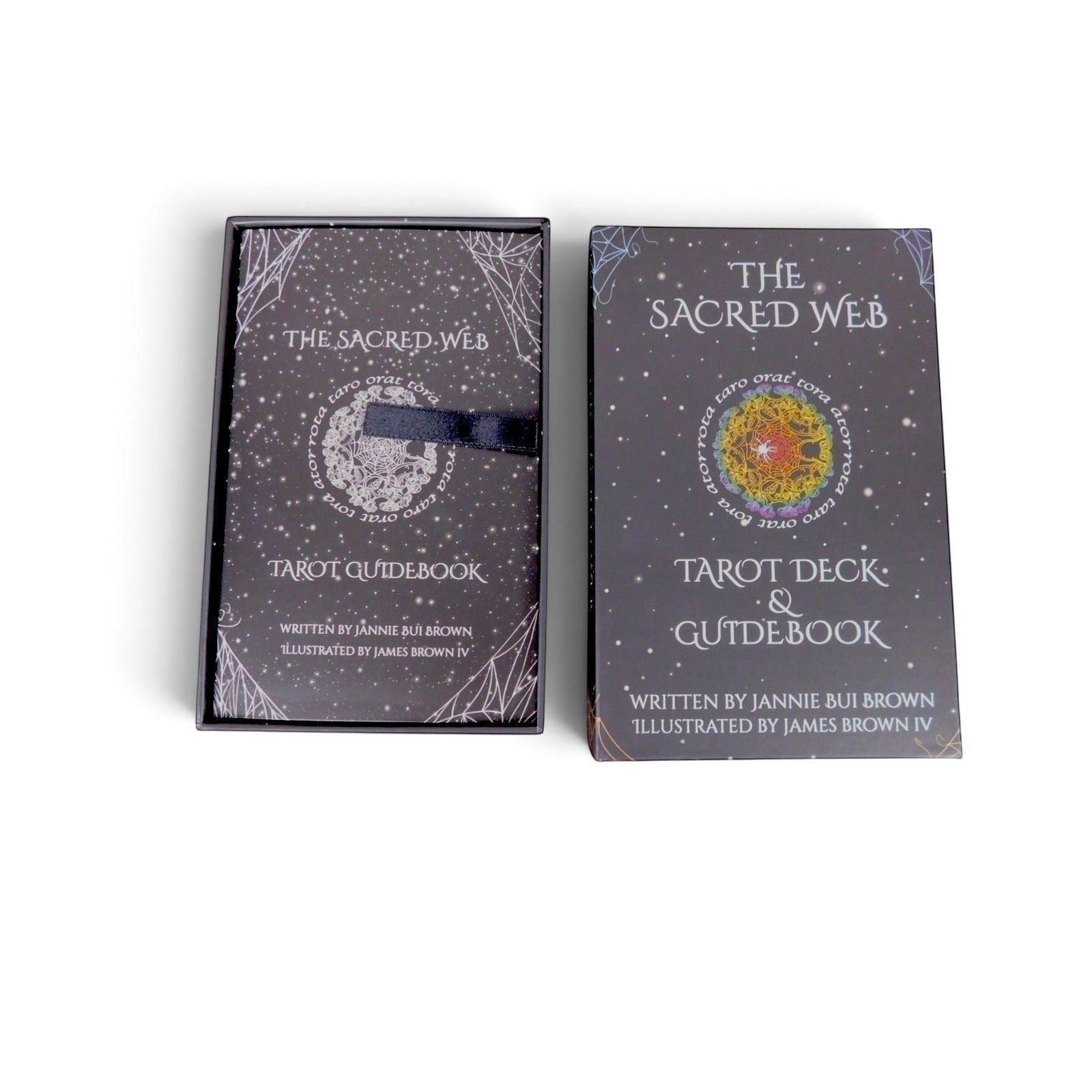 The Witches' Quest The Sacred Web tarot deck and guidebook set in a dark charcoal box with rainbow mandala artwork.