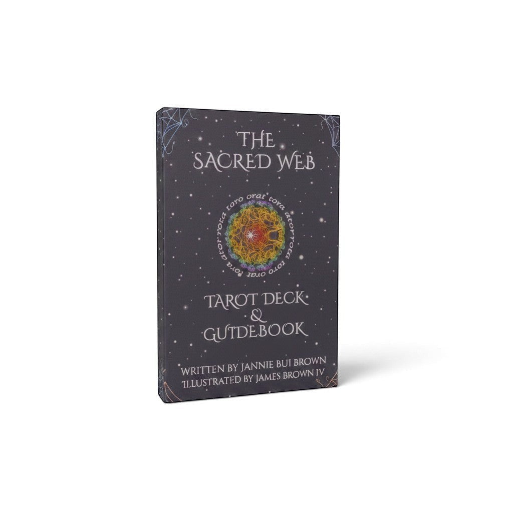 The Witches' Quest The Sacred Web tarot deck and guidebook set in a dark charcoal gray illustrated keepsake box.