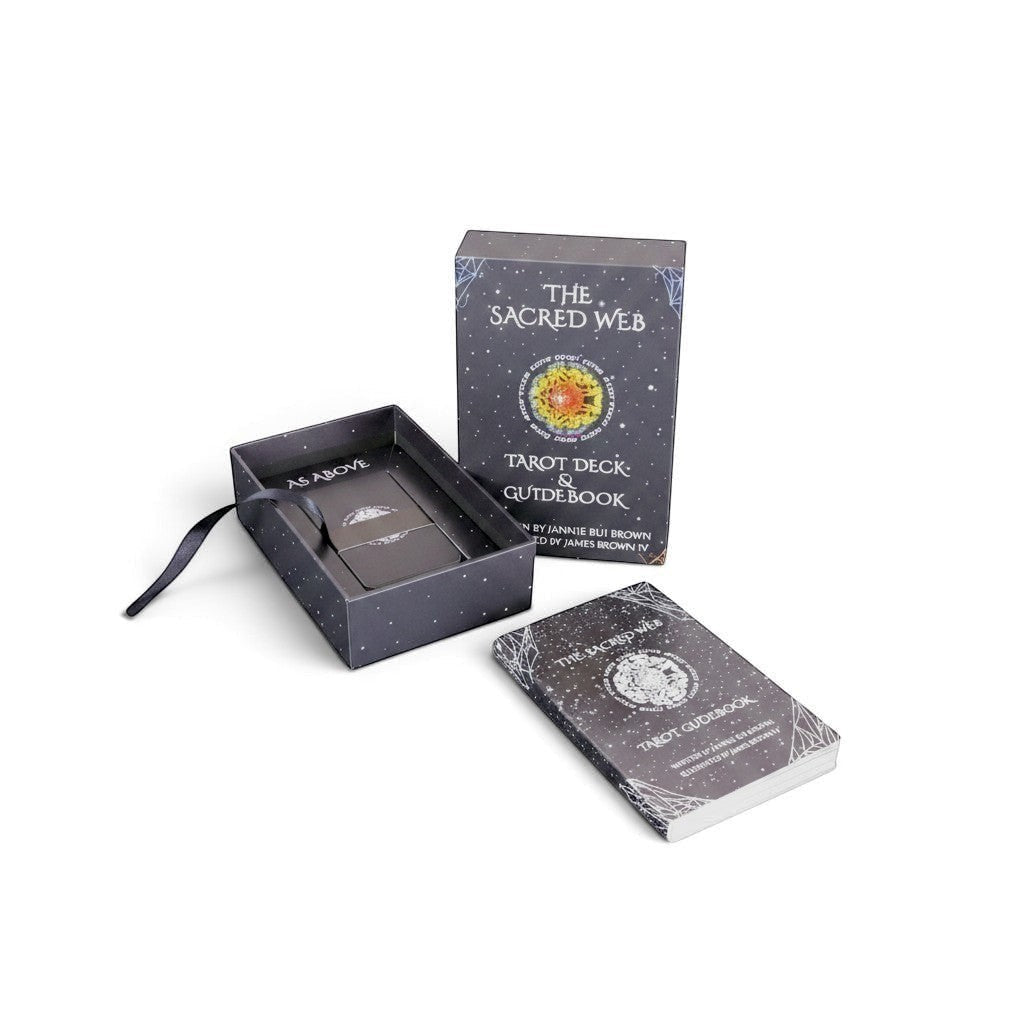 The Witches' Quest The Sacred Web tarot deck and guidebook set in a charcoal gray box with cosmic mandala artwork.