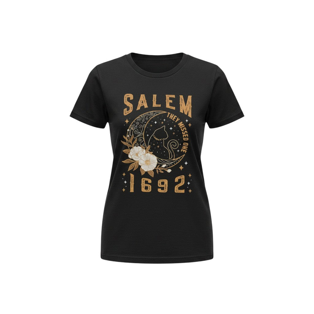 The Witches' Quest black cotton unisex t-shirt featuring a Salem 1692 graphic with a cat, moon, and floral design.