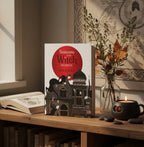 The Witches' Quest Seasons of the Witch Samhain Journal with mystical cover art on a wooden shelf with a candle.