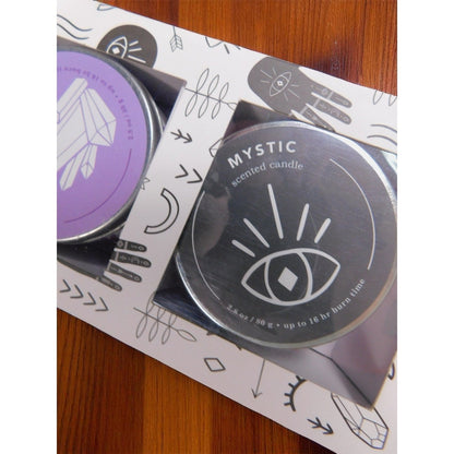 The Witches' Quest You Are Magic scented candle set featuring Mystic black tin and purple tin in decorative box