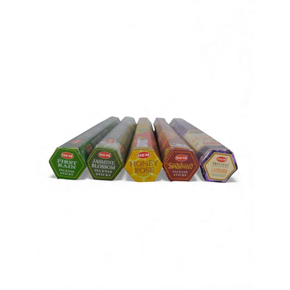 The Witches' Quest self-love incense pack featuring five hexagonal tubes of HEM incense sticks in various scents.