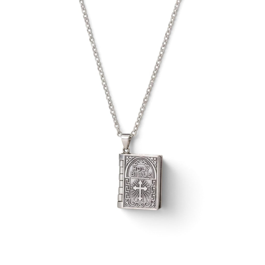 The Witches' Quest silver tone rectangular Bible locket pendant necklace with a cross motif on a 26-inch chain.