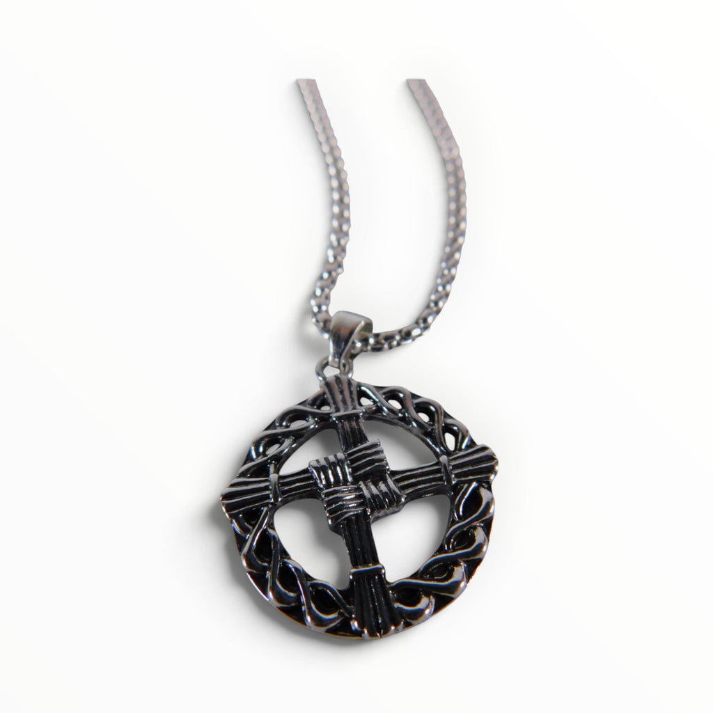 The Witches' Quest silver tone St. Brigid’s Cross pendant necklace featuring a woven design inside a circular frame.