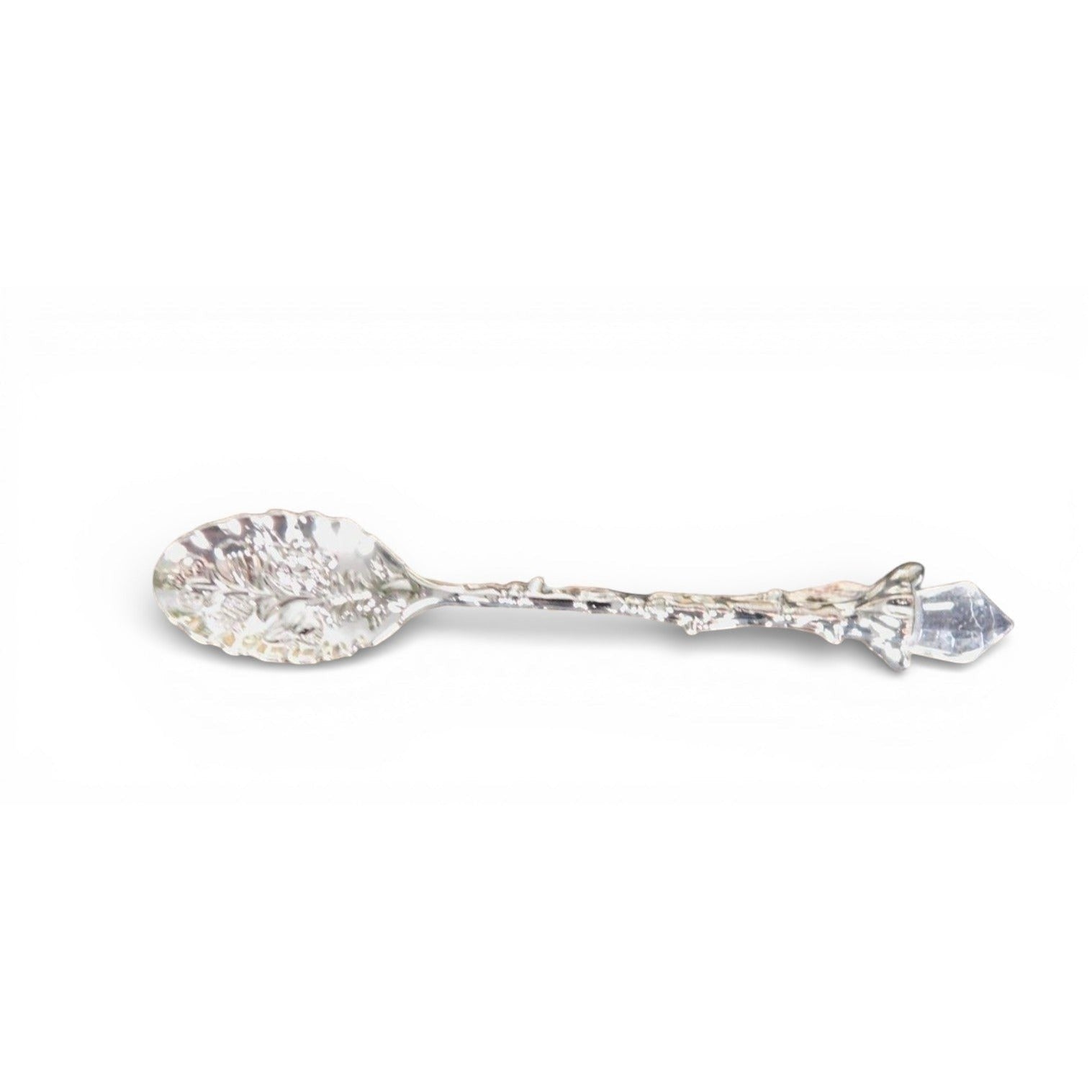 The Witches' Quest silver alloy teaspoon featuring an ornate leaf-shaped bowl and a twig handle with a crystal point.