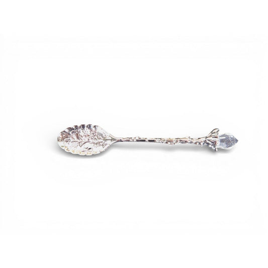 The Witches' Quest silver alloy teaspoon with an ornate leaf bowl and a twig-inspired handle topped with a clear crystal.
