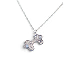 The Witches' Quest silver-tone alloy cross locket necklace with floral filigree and magnetic closure on an 18-inch chain