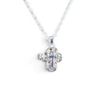 The Witches' Quest silver-tone alloy cross locket necklace with intricate floral filigree and a magnetic closure.