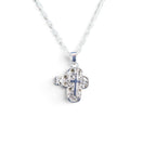 The Witches' Quest silver-tone alloy cross locket necklace with intricate floral filigree and a magnetic closure.