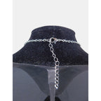 The Witches' Quest silver-tone necklace chain with lobster clasp and adjustable extender on a black display bust