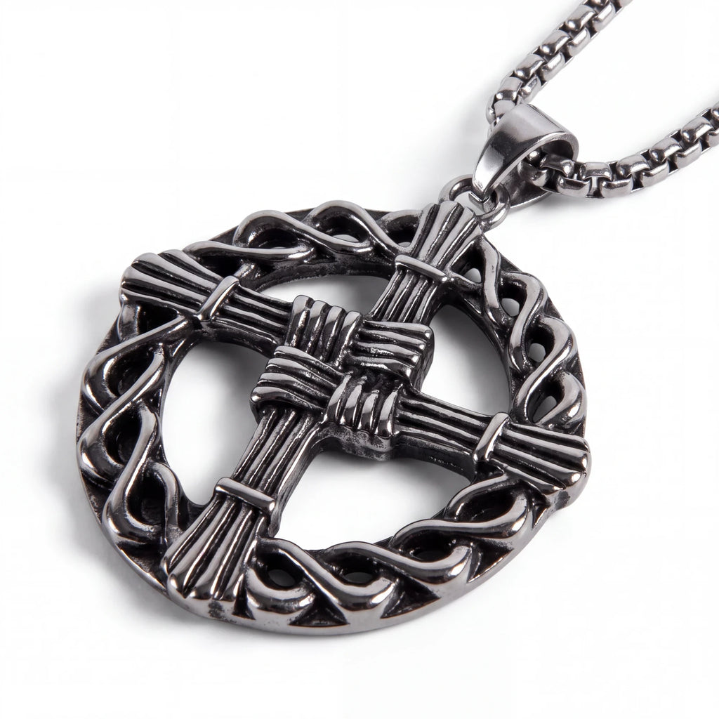 The Witches' Quest silver tone St. Brigid’s Cross pendant necklace featuring a woven circle design on a link chain.