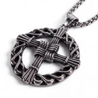 The Witches' Quest silver tone St. Brigid’s Cross pendant necklace featuring a woven circle design on a link chain.