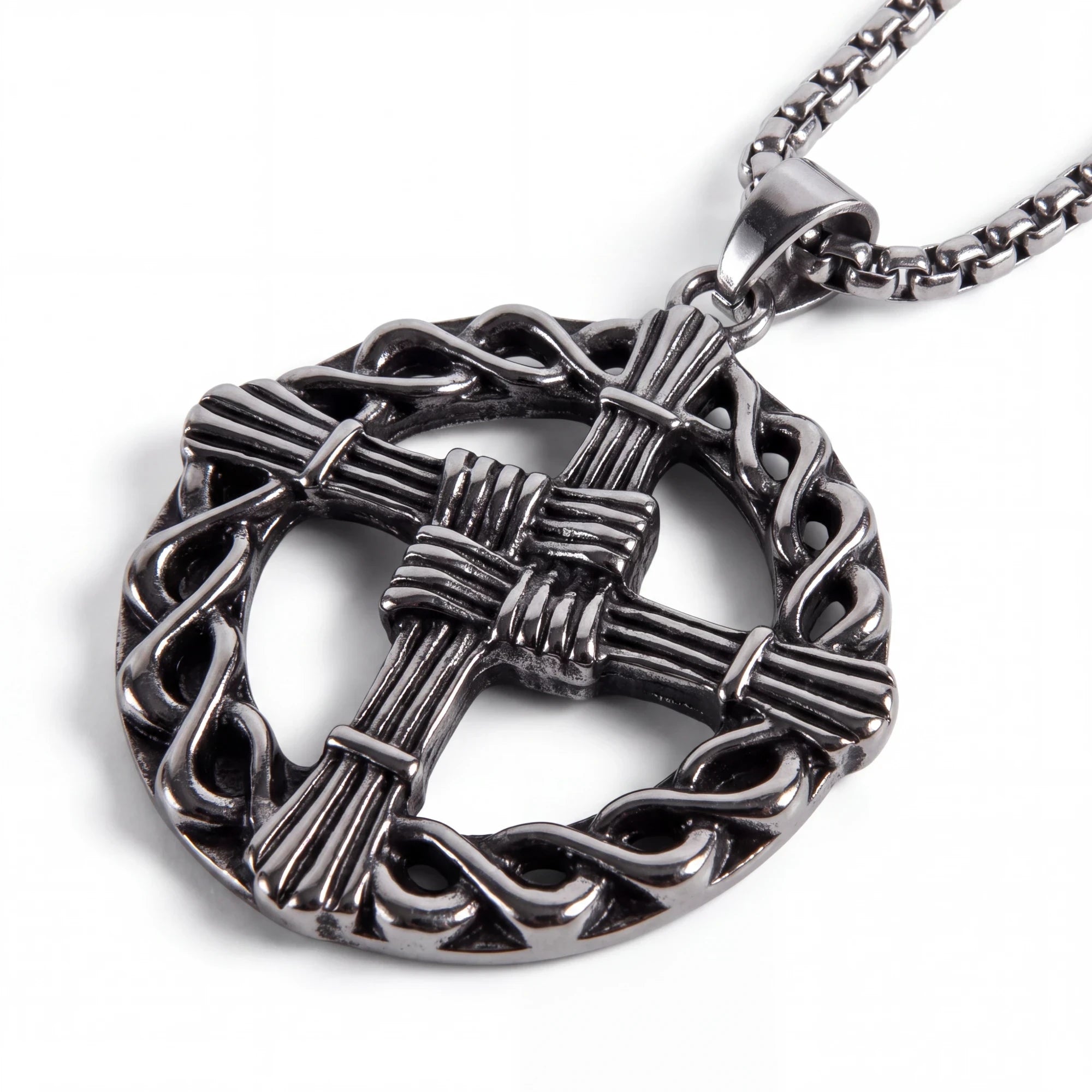 The Witches' Quest silver tone St. Brigid’s Cross pendant necklace featuring a woven circle design on a link chain.