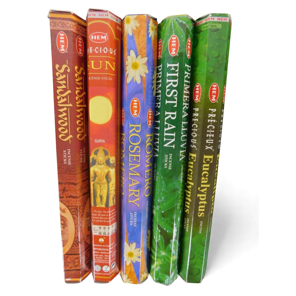 The Witches' Quest solar incense pack featuring five HEM scent tubes including Sandalwood, Sun, Rosemary, First Rain, and Eucalyptus.