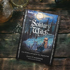 The Solitary Witch Oracle deck by The Witches' Quest featuring ethereal forest artwork with a witch and cat