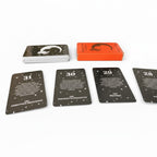 The Witches' Quest mini Spanish angel number tarot cards with celestial black and white designs and orange box.