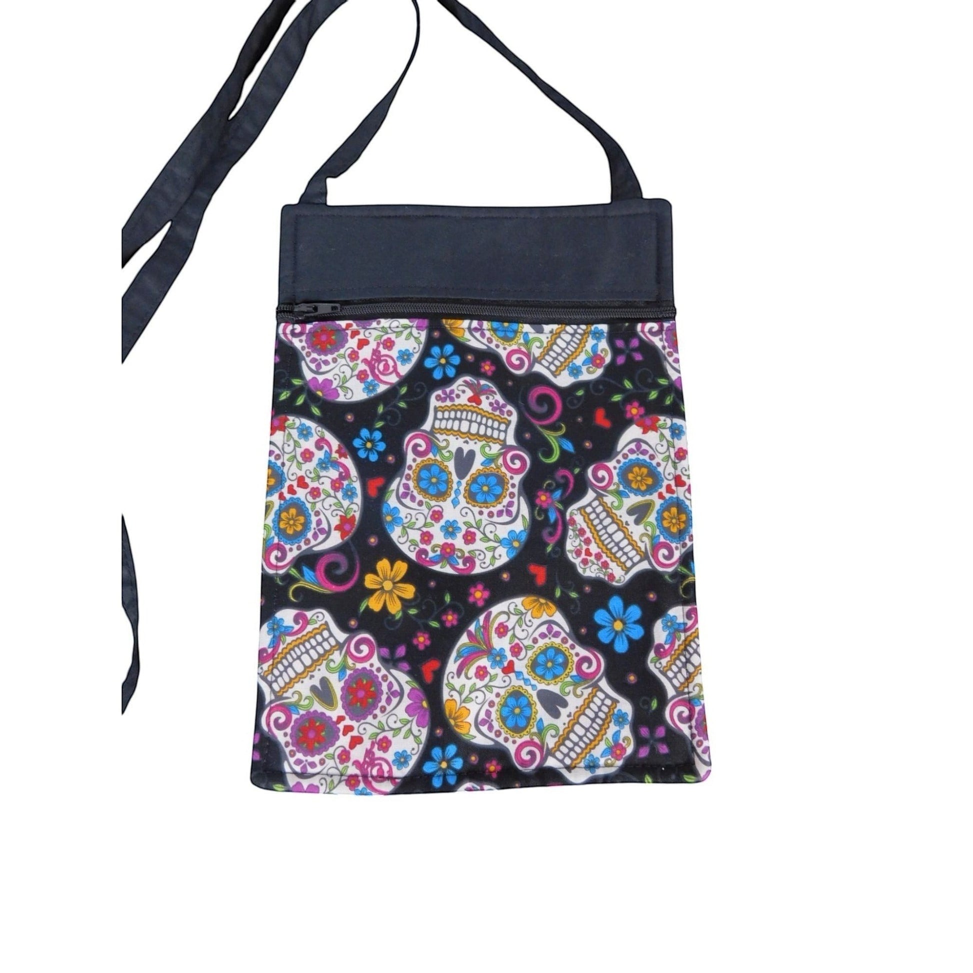 The Witches' Quest handcrafted crossbody bag featuring a vibrant, colorful sugar skull pattern on a black background.